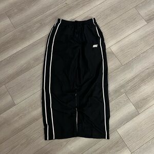 Vintage Nike Black Baggy Track Pants with White Stripes